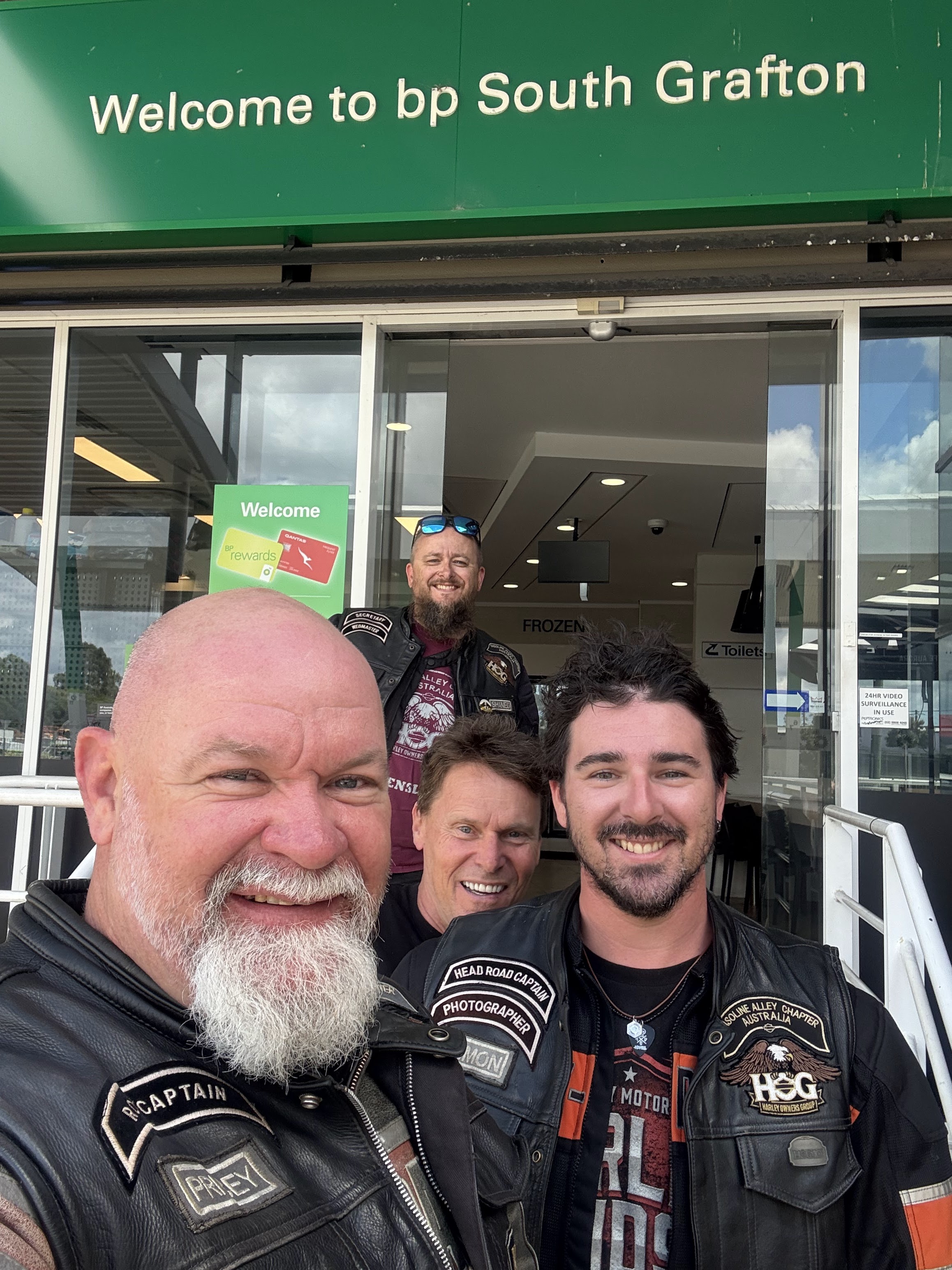 The crew at BP South Grafton — HOG vests and grins