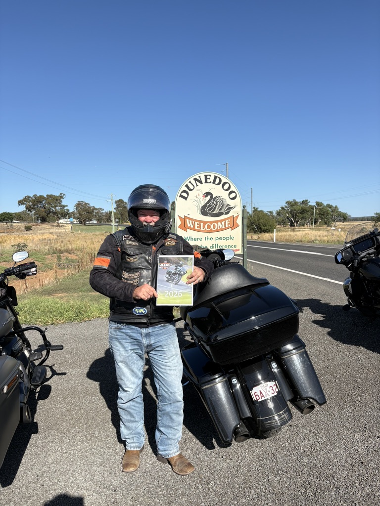 Dunedoo Welcome sign - ABC calendar out for the town stamp
