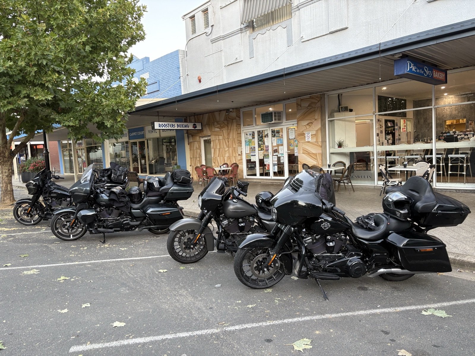 The bikes lined up out the front of the Pie in the Sky Bakery, Tumut