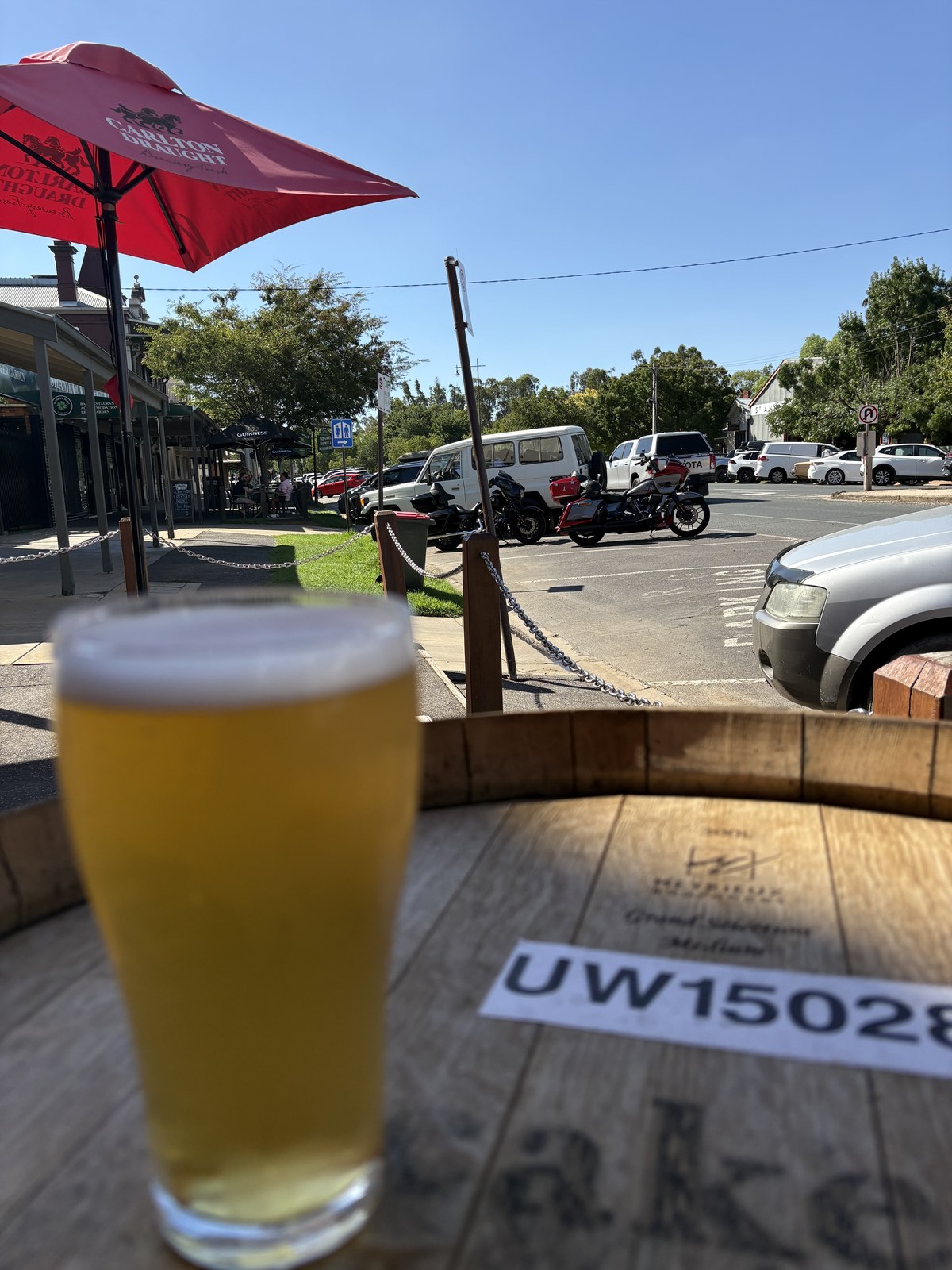 A cold one with the bikes parked across the street - Echuca on a long weekend