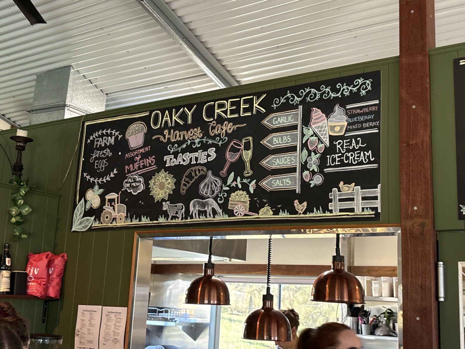 The Harvest Cafe menu board - toasties, muffins, farm fresh eggs and real ice-cream